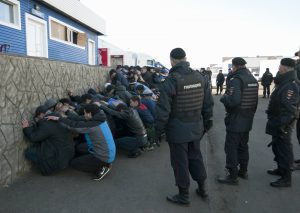 Ugly reality after capitalist counterrevolution. Russian police detain 1,200 migrants from the Caucuses who worked at a vegetable warehouse in Biryulyovo district in the south of Moscow. The October 2013 police raid followed a terrifying riot against migrants in the area by violent white supremacists. The racist police round up of the migrants thus legitimised the fascist riot.