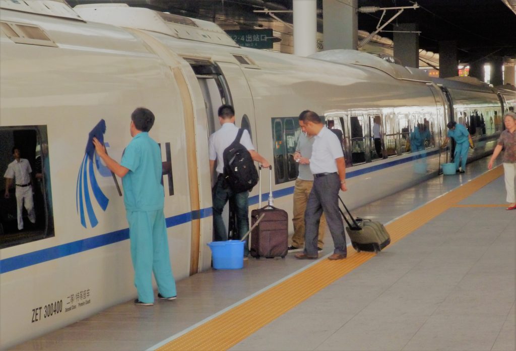 Workers clean a Chinese high-speed train prior to its 32 minute trip from Tianjin to Beijing. Like other state-owned enterprises (SOEs) in socialistic China, China Railways maintains a bloated workforce by capitalist standards in order to boost overall employment. This results in not only a high quality service for patrons but a relatively relaxed workplace environment for workers – especially when one considers the high level of job security for workers in most of China’s SOEs. Such a low-stress workplace environment, where workers do not feel under pressure to cut corners on safety or recklessly speed up production, naturally leads to a relatively high level of workplace safety in China’s socialistic SOEs. It is these SOEs that dominate the commanding heights of China’s economy.