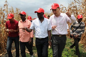 Luanda, Angola: Pedro Canga, Angolan Agriculture minister tours a corn farm developed by Chinese state-owned firm CITIC Construction company. Investments in Africa by state-owned Chinese firms have mostly been highly regarded by African peoples. 
