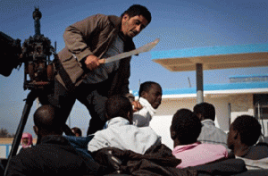 Racist Libyan NTC “Rebels” terrorise black Libyans and African migrant workers.