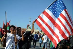 Libyan “rebels” carrying the American flag. These forces are henchmen for imperialism and must be defeated.