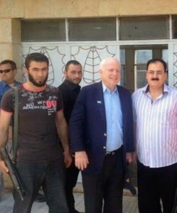 Mccain next to Al-Qaeda – and now ISIS – operative (holding a gun) and General Salem Idris, then leader of the “moderate” Free Syrian Army proxies of imperialism. 