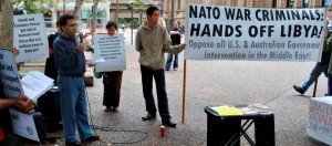 27 March 2011, Sydney: The first action in Australia against the NATO attack on Libya opposed all forms of imperialist intervention – military, diplomatic and funding of political groups – in the Middle East and called to “Defeat the NATO air strikes on Libya.” Trotskyist Platform (the initiator of the action), Supporters of the Iranian Peoples Fadaee Guerillas, the then Revolutionary Socialist Party and more anti-imperialist individuals within the Stop the War Coalition participated in the rally. Trotskyist Platform was the only bona-fide left group in Australia to fight for the defence of Libya against the NATO imperialists and their “Rebel” proxies.