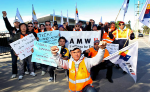 Photo Credit: AMWU Triumphant workers at the Ausreo site in western Sydney after learning that their struggle had forced the company to grant them a real wage increase. The workers, members of the AMWU manufacturing workers union, picketed the site for 10 weeks after the bullying bosses locked out the workers and refused to negotiate a pay rise. The workers defiant struggle won solidarity from many other trade unionists. Class struggle methods are the road to workers victory!