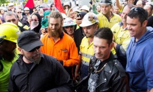 2 May 2014, Brisbane: Neo-Nazi filth (wearing a black shirt and leather jacket) cower in the face of the mass trade union centred mobilisation. The workers when truly united - and conscious of their collective class interests - can never be defeated.