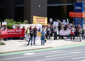 4 September 2014: Refugee rights supporters hold a protest in solidarity with Iranian asylum seeker, Hamid Kehazaei outside Brisbane’s Mater Hospital. The 24 year-old had been pronounced brain dead by doctors at the hospital three days earlier. Imprisoned at the Manus Island immigration detention centre, he cut his foot and developed septicaemia which led to his death. This highly preventable tragedy was due to the hellish conditions at the Manus Island detention centre, the lack of proper medical facilities there and the criminal neglect of the detention centre authorities. Credit: Robert Leech