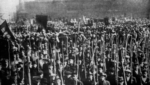 Russia, 1917: Armed, pro-communist masses march on the capitalist Provisional Government.