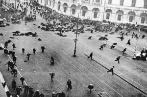 Petrograd (now St Petersburg), Russia, July 1917: Demonstrators lie flat on the street and run for cover after the capitalist Provisional Government unleashed troops to open fire on a huge demonstration of pro-communist workers and their allies. The capitalist military killed or injured hundreds of demonstrators. This incident occurred just three months before the 1917 Russian Revolution. The workers can only take power by physically smashing the violent efforts of the capitalists to cling on to their rule.