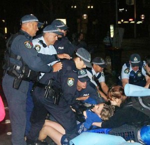 Sydney, October 2011: Australian police brutally attack the anti-inequality Occupy Sydney protests. Imagine the lengths that the capitalist state will go to when faced with a socialist takeover. The road to socialism can only be opened by forcibly clearing out the violent capitalist state through workers’ revolution.