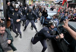 Spain, 29 September 2010: Police attack workers picketing in Santiago de Compostela, northern Spain, during a nationwide general strike against brutal austerity measures.
