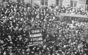 Russia, International Women’s Day, 1917: Mainly female textile workers go on strike for bread sparking a general strike and the toppling of the Tsar in the February Revolution. The banner reads “Glory to the Women Fighters for Freedom!”