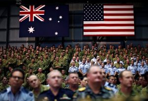 Australian and American troops in Darwin listen to the November 2011 speech by Obama where he outlined his agreement with the Australian government to station thousands of U.S. troops in Darwin in a move clearly aimed against socialistic China. NATO and its Australian ally have used the standoff over Ukraine to justify increased military deployments that are, in good part, aimed against China.