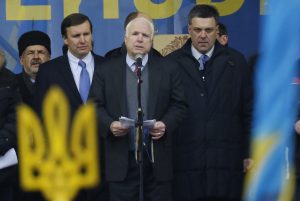Kiev: Prominent US Senator John McCain openly supporting the Ukrainian right wing then opposition forces that took power in the February 2014 coup. Among the groups McCain lionised are outright fascist parties. Here pictured to McCain’s left is the fascist Svoboda party leader, Oleh Tyahnybok.