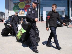 Australian Federal Police arrive in Ukraine on the pretext of the MH17 air crash investigation. The deployment of these police - for work that should have been done by specialist pathologists and air crash investigators - to an area controlled by a force (the Donetsk rebels) that the Australian regime opposes was meant to assert Australian imperialism’s “right” to jackboot wherever they please. Australian cops are often deployed to enforce the Australian capitalists’ tyranny over the peoples of the South Pacific. 