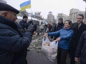Blatant! U.S. Assistant Secretary of State, Victoria Nuland, and U.S. Ambassador to Ukraine, Geoffrey Pyatt, hand out bread to the Ukrainian right wing, then opposition, forces in the lead up to their seizure of power in February 2014.