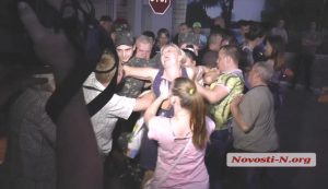 Mykolaiv, southern Ukraine, 2 September 2014: Relatives try to prevent conscripted Ukrainian soldiers from being sent to the eastern Ukraine front. The conscripted troops were only able to be taken away after police violently dragged away the protesting mothers and other relatives.