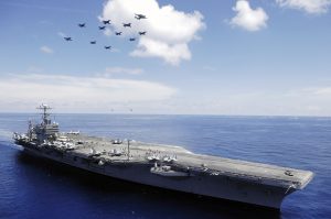 American aircraft carrier, the USS Abraham Lincoln, in the South China Sea. A very long way from home but not so far from China!