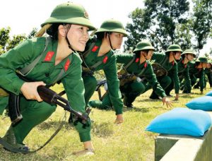 2014: Women soldiers in the army of the Vietnamese workers state in training. The founding personnel, traditions and culture of the Vietnamese workers state’s organs were, like those of the other workers states in China, Cuba, North Korea and Laos, formed during the heroic liberation struggle against capitalism and imperialism. An important part of these new traditions and culture included placing women’s role in society at a much higher level than where it had been during pre-revolutionary times.