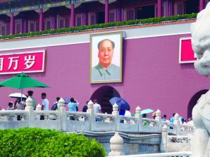 A giant portrait of Chinese communist revolutionary leader, Mao Tse Tung, looks over Beijing’s main square. Photo: Trotskyist Platform. 