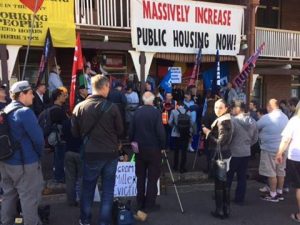 Picture of public housing protest occupation in defiance of the capitalist sheriff.